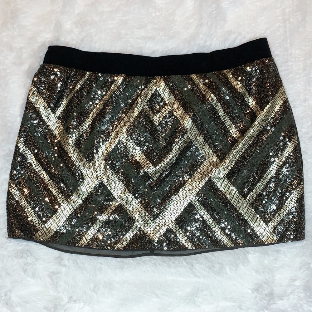 Black and gold sequined mini skirt
